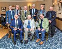 March 2022. 25 year service Awards to (L-R) Norman J Leishman; Neil S Curr; James M Grant; Ewan W Bannerman; John G Thom; Richard A Frenz. In front are Charles M Gallagher and Moderator David B Cuthbert Jnr (Photo by Richard Wilkins)